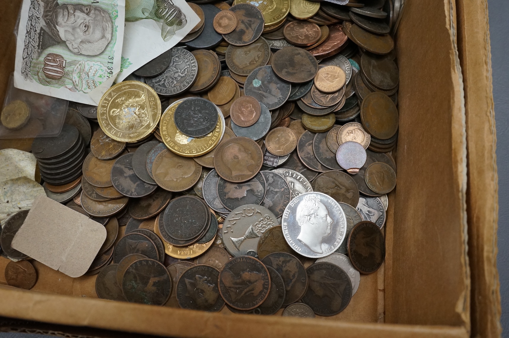 A large collection of mixed world coins, and replica coins
